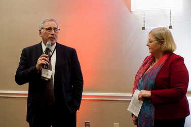 Dr. Prystowsky and Mellanie True Hills announcing the renaming of the award to the Eric N. Prystowsky, MD Advocate for Patients Award at the reception at the 2016 Get In Rhythm. Stay In Rhythm.™ Atrial Fibrillation Patient Conference